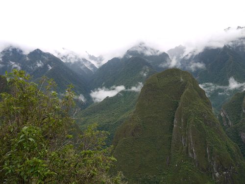 Mist clouds of the peaks of Machu Picchu