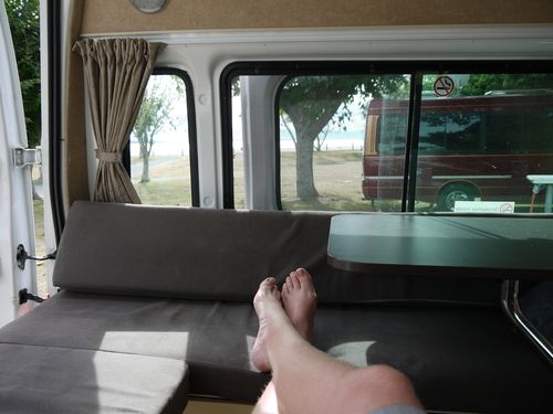 View of the sea from inside the camper